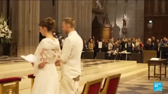 'Video thumbnail for Notre-Dame hosts rare wedding for carpenter who helped rebuild it'