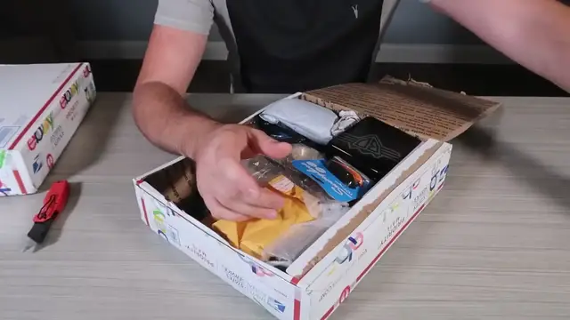 'Video thumbnail for Unboxing $300 Wholesale Box from eBay'