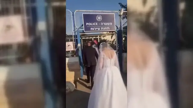 Video thumbnail for Israel: Palestinian Bride and Groom Detained During Wedding Procession.