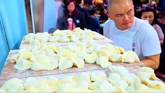 'Video thumbnail for Fastest Dumplings (WORLD RECORD!) STREET FOOD in Taipei's BEST Night Market | Taiwan Street Food'