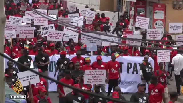 'Video thumbnail for Ghana's debt distress: Demonstrators condemn high cost of loans for Africa'