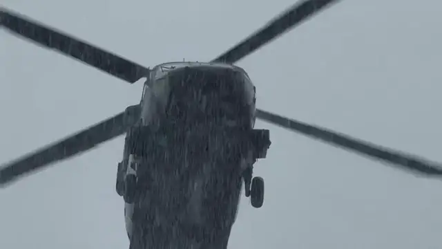 Video thumbnail for US: Helicopter Flies During Heavy Rain in Rochester, NY.