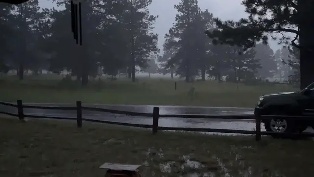 Video thumbnail for US: Thunderstorm Brings Flooding Rain to Evergreen, CO.