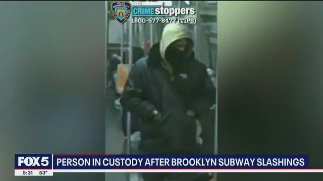 'Video thumbnail for Suspect in Q train slashing taken into custody as police probe link to two more attacks'