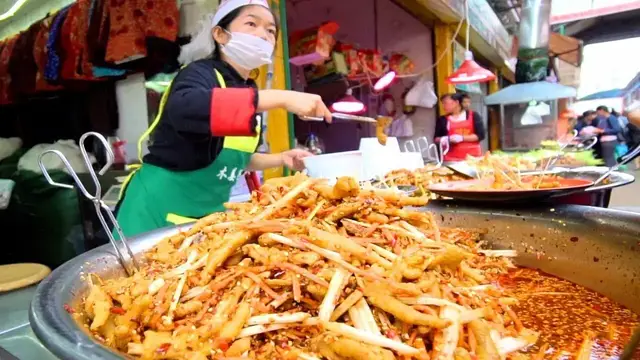 'Video thumbnail for BUMBLEBEE RICE - Street Food in China | Rare CHINESE STREET FOOD Tour in Kunming, China (SPICY!)'