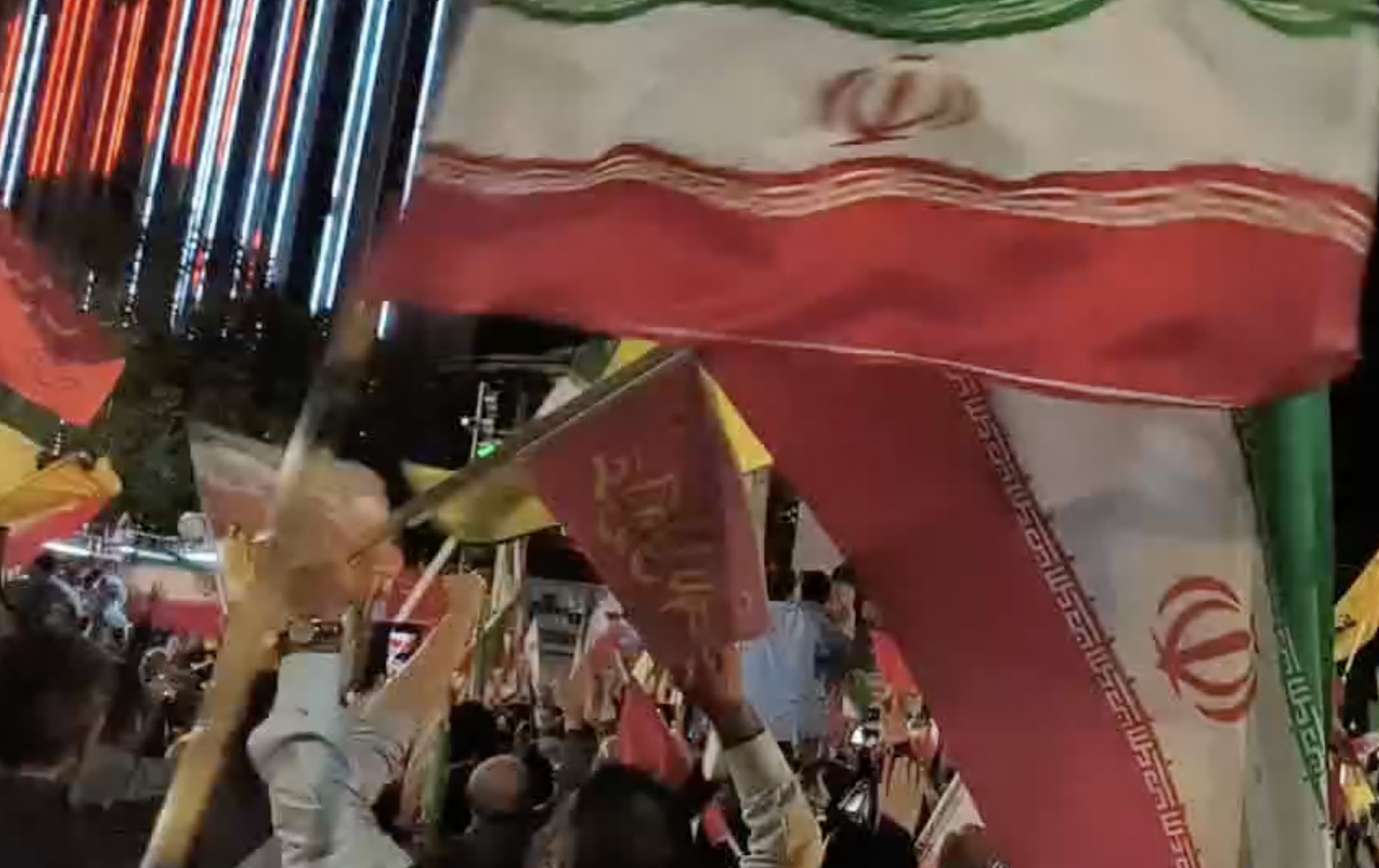 Video thumbnail for Celebrations seen in Tehran as missiles fly overhead towards Israel