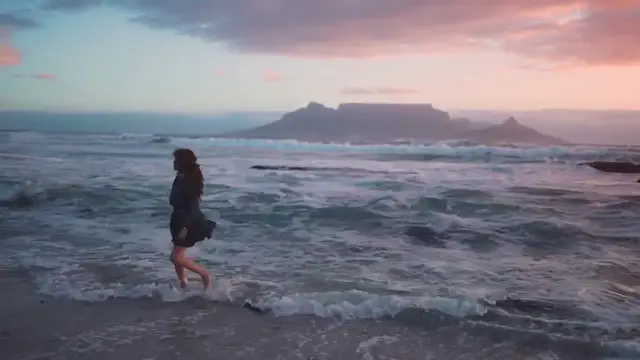 Video thumbnail for Woman Running to Sea