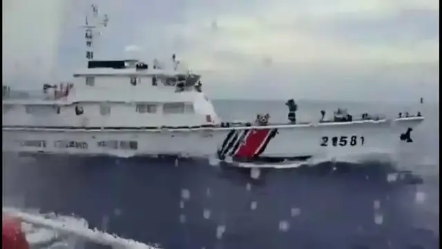 Video thumbnail for Philippines: China Coast Guard Fires Water Cannons At Philippine Vessels Near Disputed Shoal.