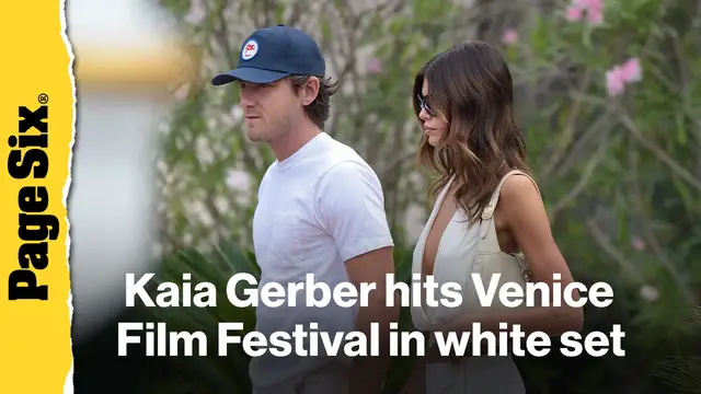 'Video thumbnail for Kaia Gerber hits Venice Film Festival in plunging white skirt set with Lewis Pullman'