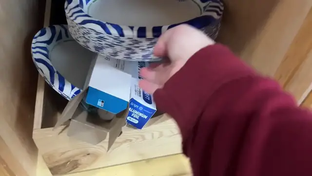 Video thumbnail for Put a Dollar Store book bin in your kitchen cabinet (this is GENIUS!)