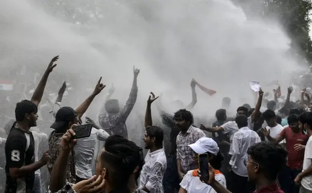 Video thumbnail for Water cannon deployed at India education system protests