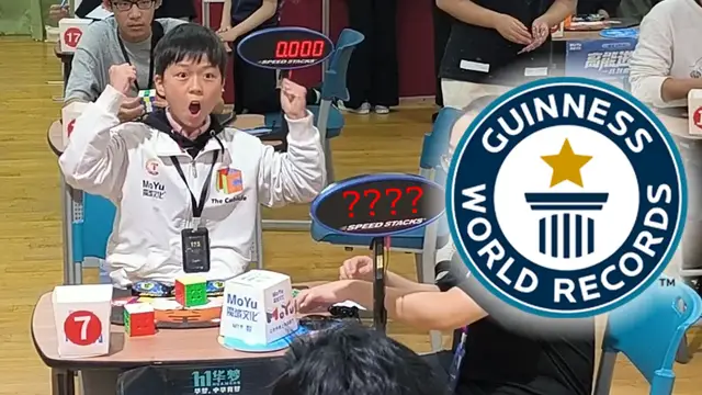 Video thumbnail for 11 year old Yiheng Wang sets fastest rotating puzzle cube record