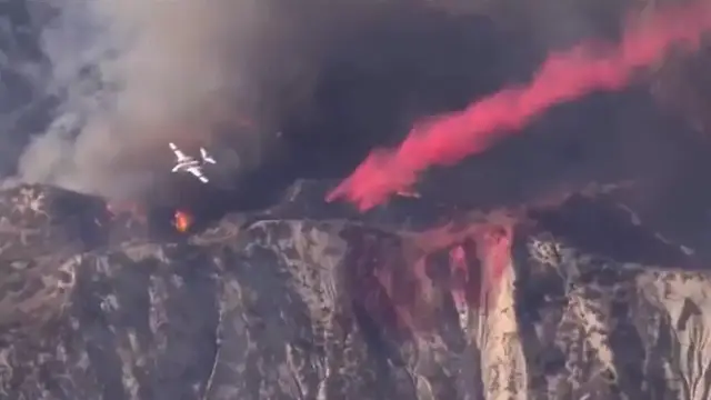 'Video thumbnail for Los Angeles: Firefighters make progress against blaze that forced thousands to flee'