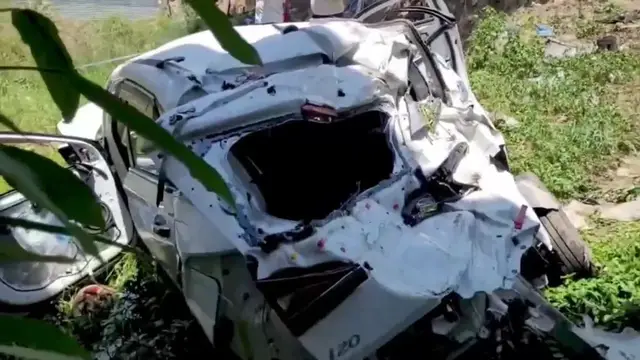 Video thumbnail for India: Speeding car loses control near bridge, plunges into ditch along bypass leaving two injured.