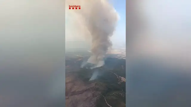 Video thumbnail for Spain: Wildfire rages in Spain's Catalonia as firefighters battle shifting winds.