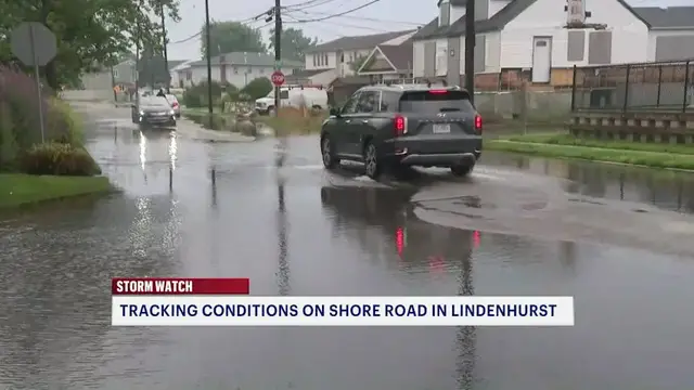 Video thumbnail for Heavy rain brings flooding to streets across Long Island 