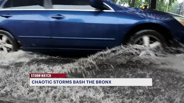 Video thumbnail for Heavy rain leaves flooded roadways, submerged sidewalks across the Bronx