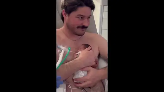 Video thumbnail for Father Holding Premature Baby during Long NICU Journey