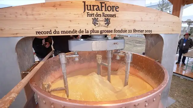 Video thumbnail for French event produces largest cheese fondue