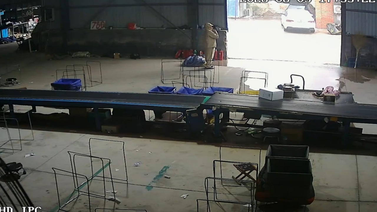 Video thumbnail for Wind Blows Gate Into Man in Hebei Factory