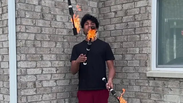 Video thumbnail for Longest duration juggling three flaming torches