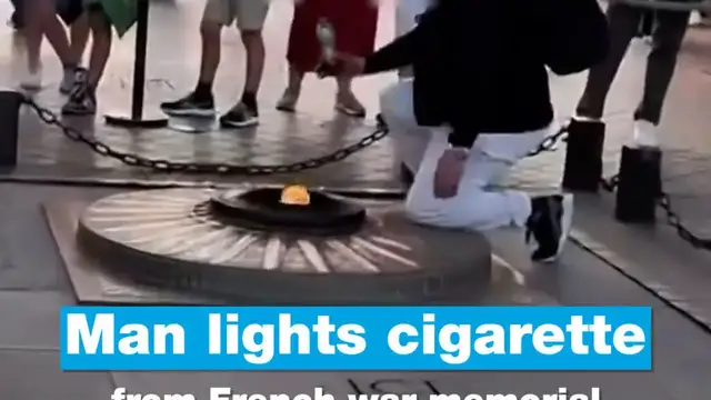 'Video thumbnail for Man lights cigarette from French war memorial'