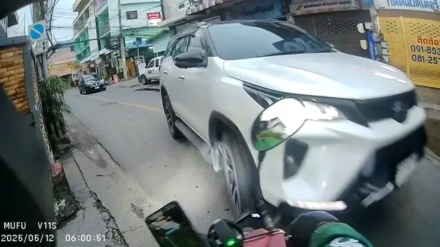 Video thumbnail for Motorcycle Crashes Into Car During Left Turn in Bangkok