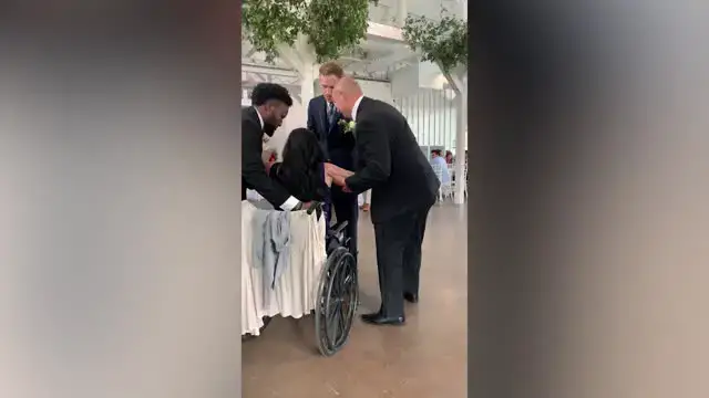 Video thumbnail for Groom Lifts Mom From Wheelchair For Emotional Mother-Son Dance | Happily TV