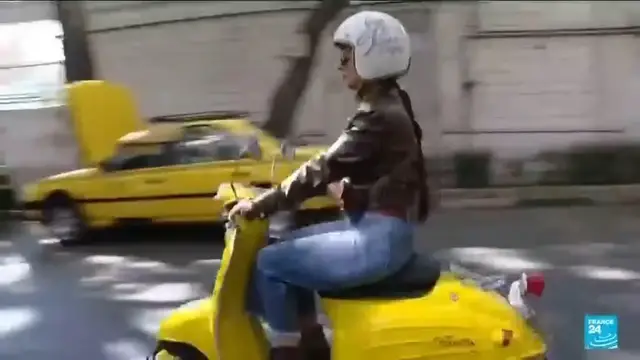 Video thumbnail for Iranian women challenge driving restrictions on motorcycles