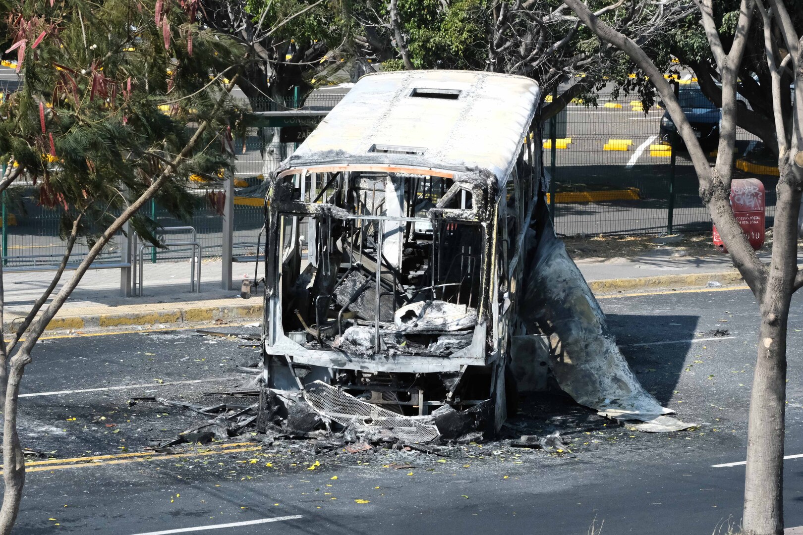 Video thumbnail for Burnt vehicles line highway near Mexican World Cup stadium