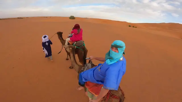 'Video thumbnail for Eating with NOMADS in the SAHARA DESERT  Medfouna (Berber Pizza) in Morocco!!'