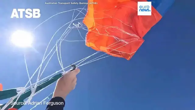 Video thumbnail for Skydiver left hanging at 4,500 metres after parachute snags on plane tail