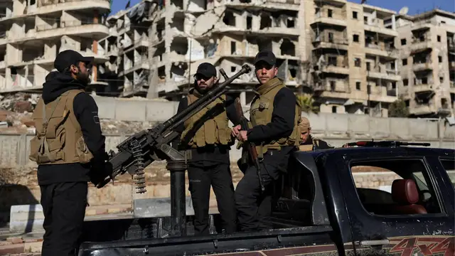 Video thumbnail for Relative calm in Syria’s Aleppo after days of fighting as Kurdish fighters disarm