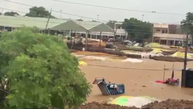Video thumbnail for India: Heavy Rain Floods Grain Markets in Punjab, Farmers Use Boats to Salvage Paddy.