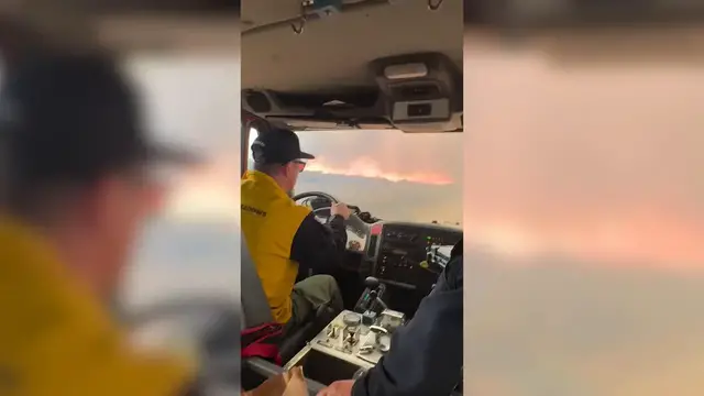 Video thumbnail for US: Firefighters drive through intense flames while battling Nevada's Bug Fire.