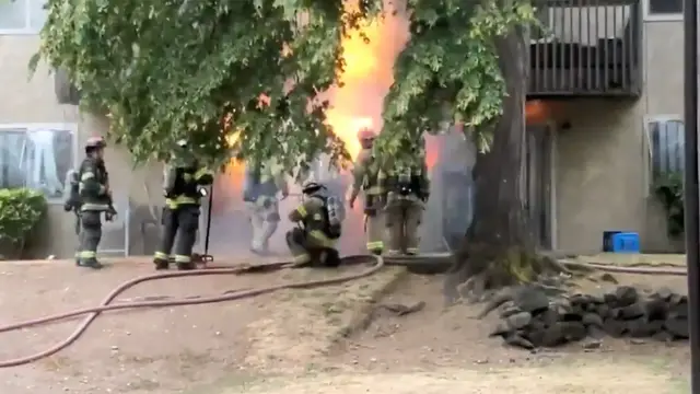 Video thumbnail for Powerful explosion as firefighters probe smoke at Tacoma apartment