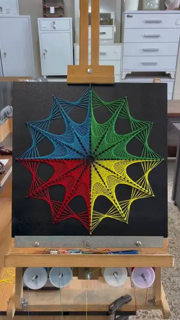Video thumbnail for Colorful Geometric String Art Mandala on Black Canvas