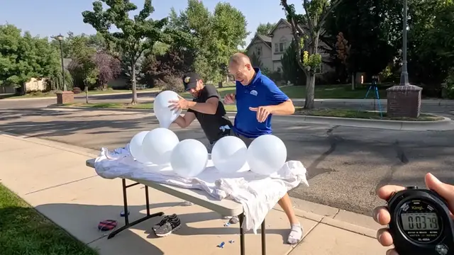Video thumbnail for Fastest time to pop 10 balloons between two people  7.49 seconds by Jonathan Hannon and David Rush