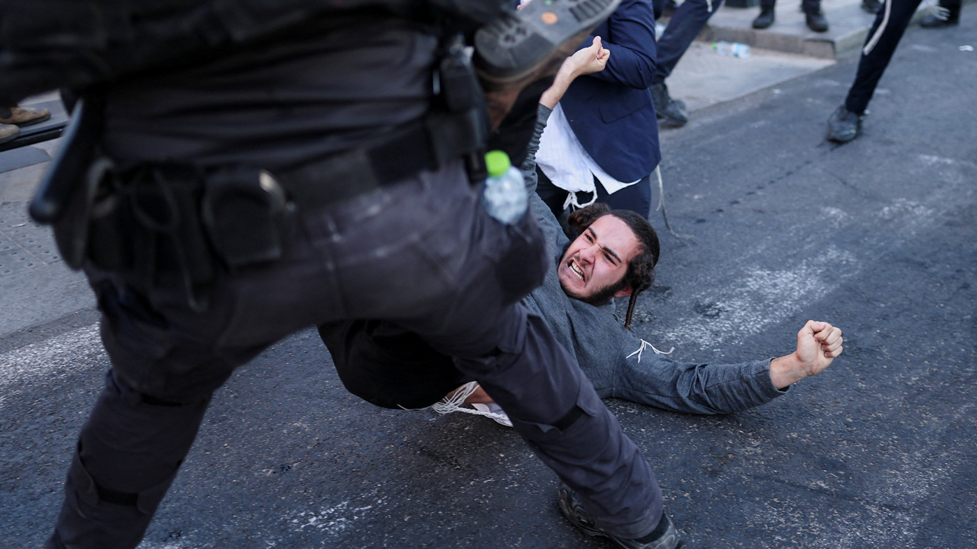 Video thumbnail for Ultra-Orthodox protesters clash with Israeli police over army draft