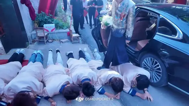 Video thumbnail for China: The Ultimate Wedding Entrance Groom Walks on His Groomsmen.