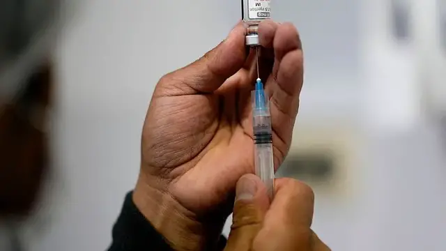 'Video thumbnail for mRNA Covid vaccines may boost cancer treatment, study finds'