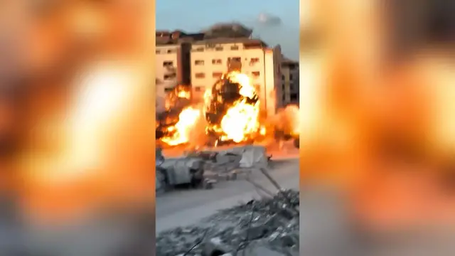 'Video thumbnail for Israeli forces destroy another Gaza City apartment building'