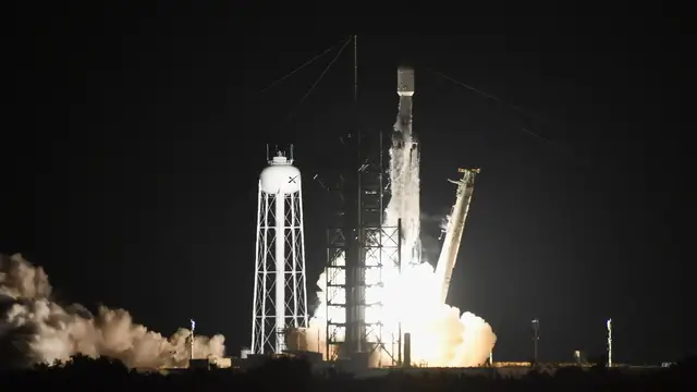 Video thumbnail for SpaceX launches classified US spy mission, caps three-launch day