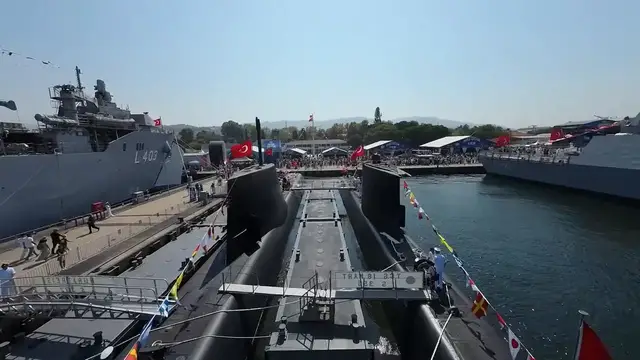 Video thumbnail for Türkiye: FPV drone footage captures TCG Sancaktar during TEKNOFEST Blue Homeland.