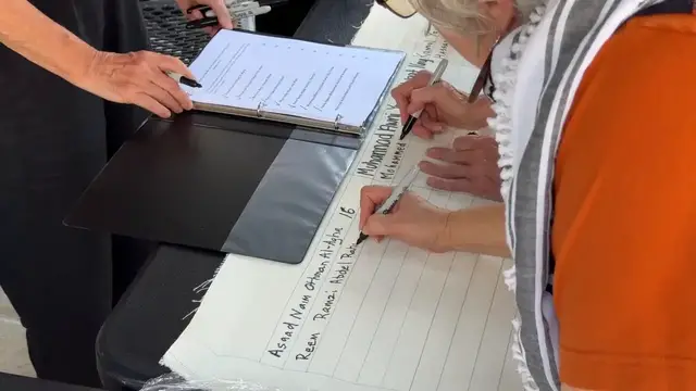 Video thumbnail for US: Giant shroud bearing names of Gaza children displayed in Philadelphia.