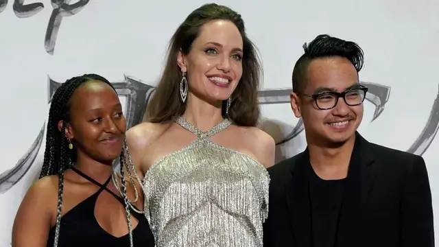 Video thumbnail for UNCAPTIONED: Angelina Jolie and Brad Pitt's daughter Zahara legally drops father's last name.