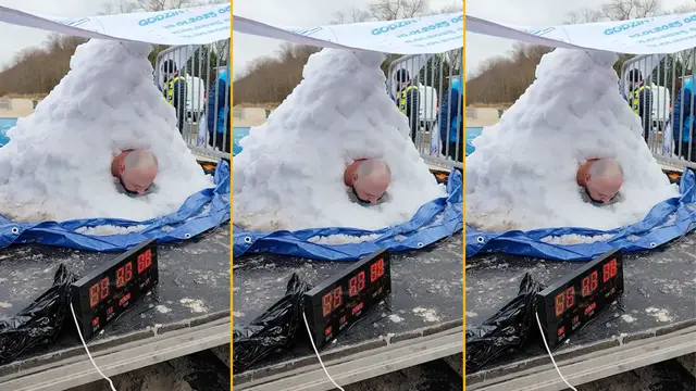 Video thumbnail for Longest time in full body contact with snow  2 hours and 30 seconds by Łukasz Szpunar