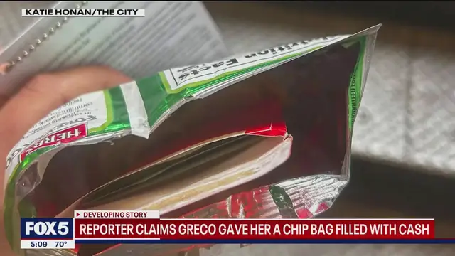 'Video thumbnail for Former Adams advisor gives reporter cash stuffed in bag of potato chips'