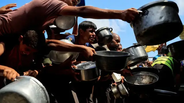 'Video thumbnail for Israel rejects famine accusations in Gaza, a war crime under international law'