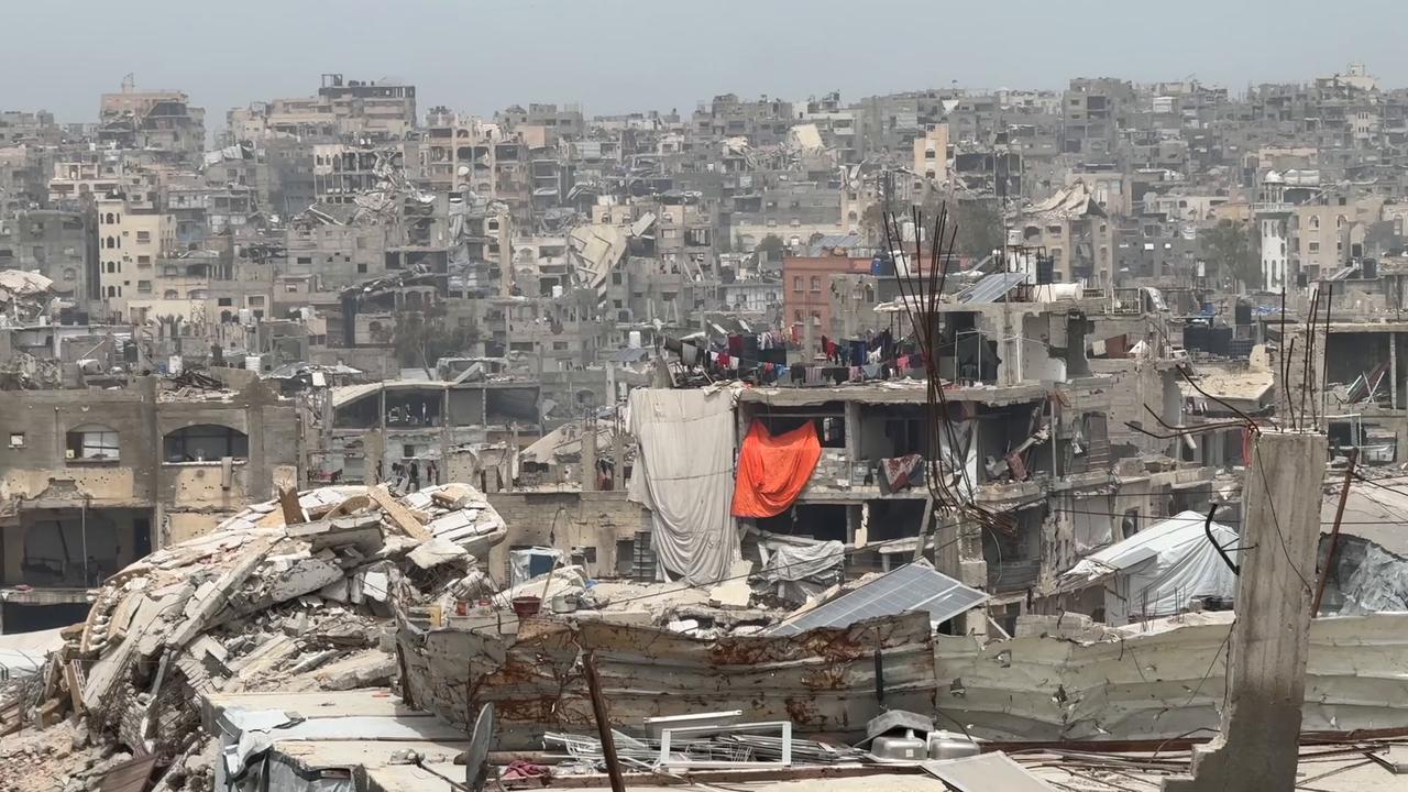 Video thumbnail for Gaza Family Searches Rubble For Relatives 19.
